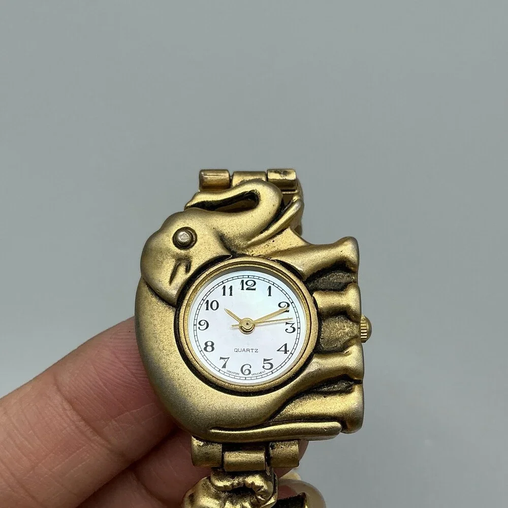 Womens Watch 31mm White Dial Gold Tone Elephant Bracelet New Battery 6.5